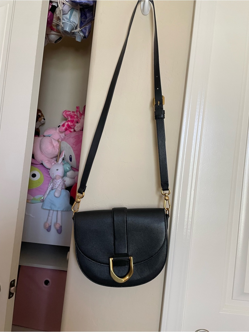 Black Leather Saddle Crossbody Bag with Gold Buckle